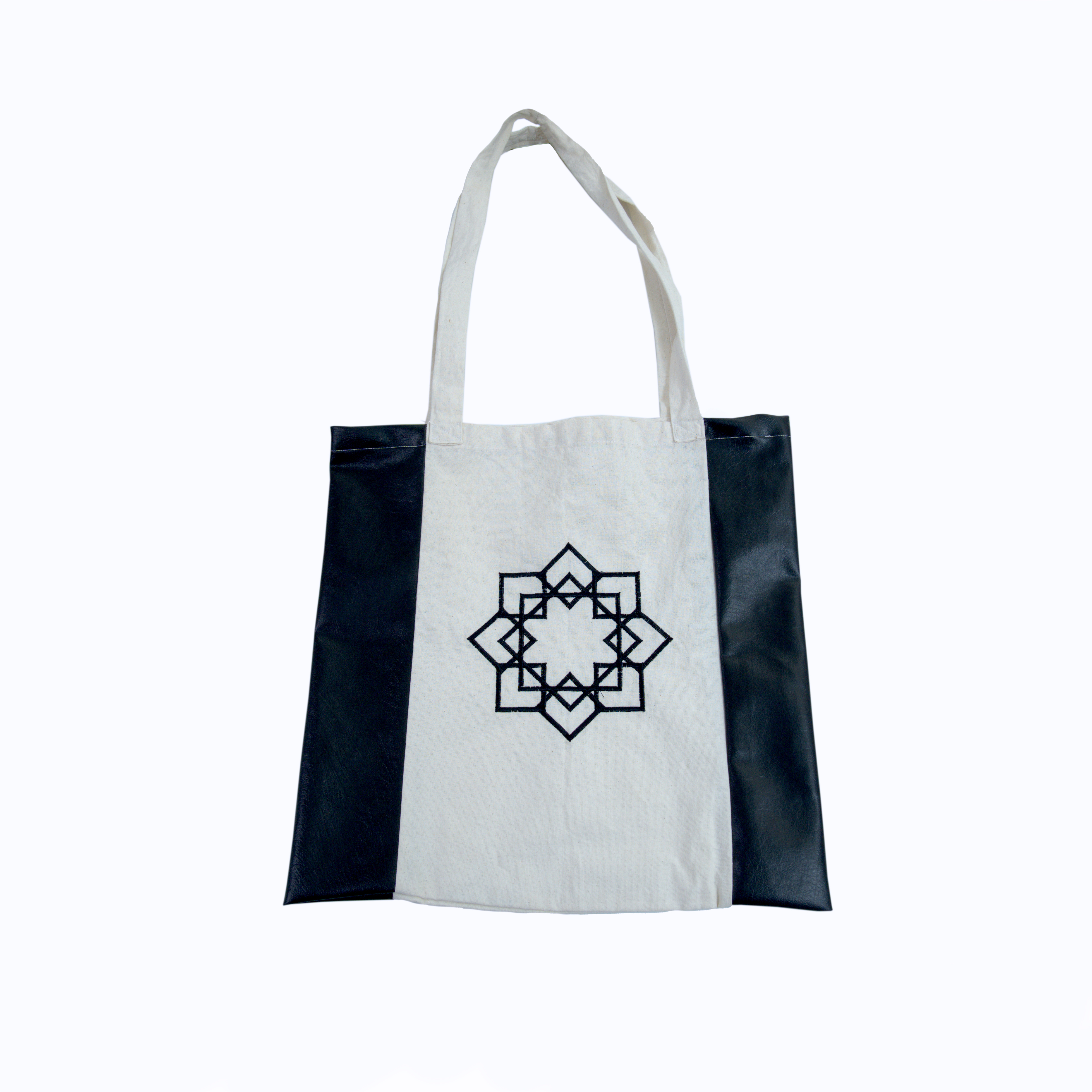 حقيبة توب مطرزة