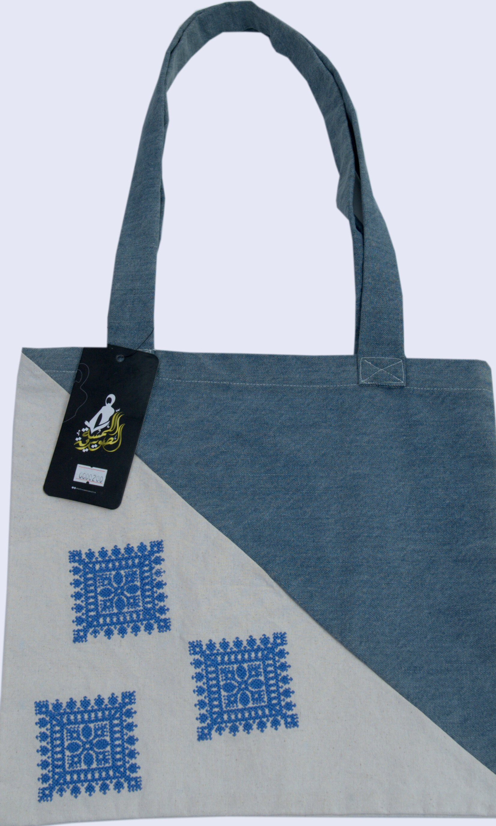 حقيبة توب مطرزة